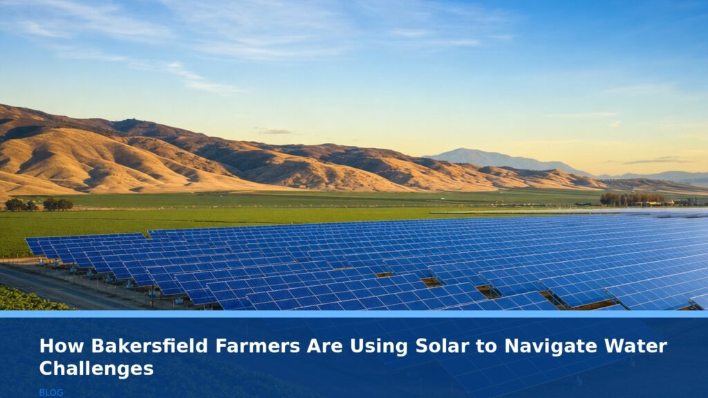Aerial view of a large, modern solar panel array installed on farmland in California's Central Valley, with a green agricultural field in the foreground and rolling hills in the background under a clear blue sky. The solar panels are clean and reflective, arranged in neat rows. No text, no logos, no readable UI text.
