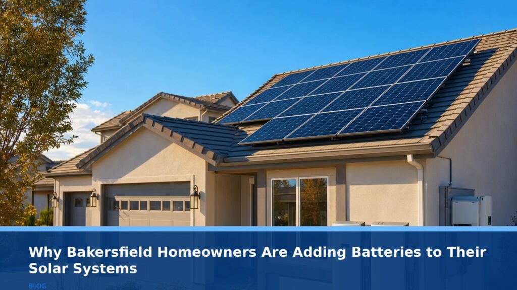 A modern solar panel array with battery storage units installed beside a suburban home in Bakersfield, California, under a clear blue sky, no text or logos